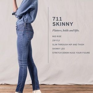 Levi 711 skinny 28 medium wash